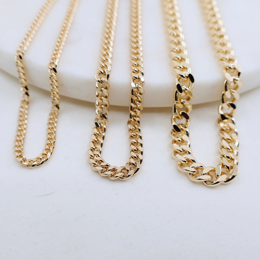 Megen Gabrielle Jewelry | Curb Chain necklace. gold fill necklace, 18k gold fill necklace, gold filled necklace, 18k gold fill necklace, Curb chain 18k gold fill. curb chain 14k gold fill.  curb chain necklace. cuban chain necklace. curb chain necklace gold. Cuban chain necklace. womens gold chain necklace. Thick curb chain necklace. Thin curb chain necklace. Thick cuban chain necklace. thin cuban chain necklace.