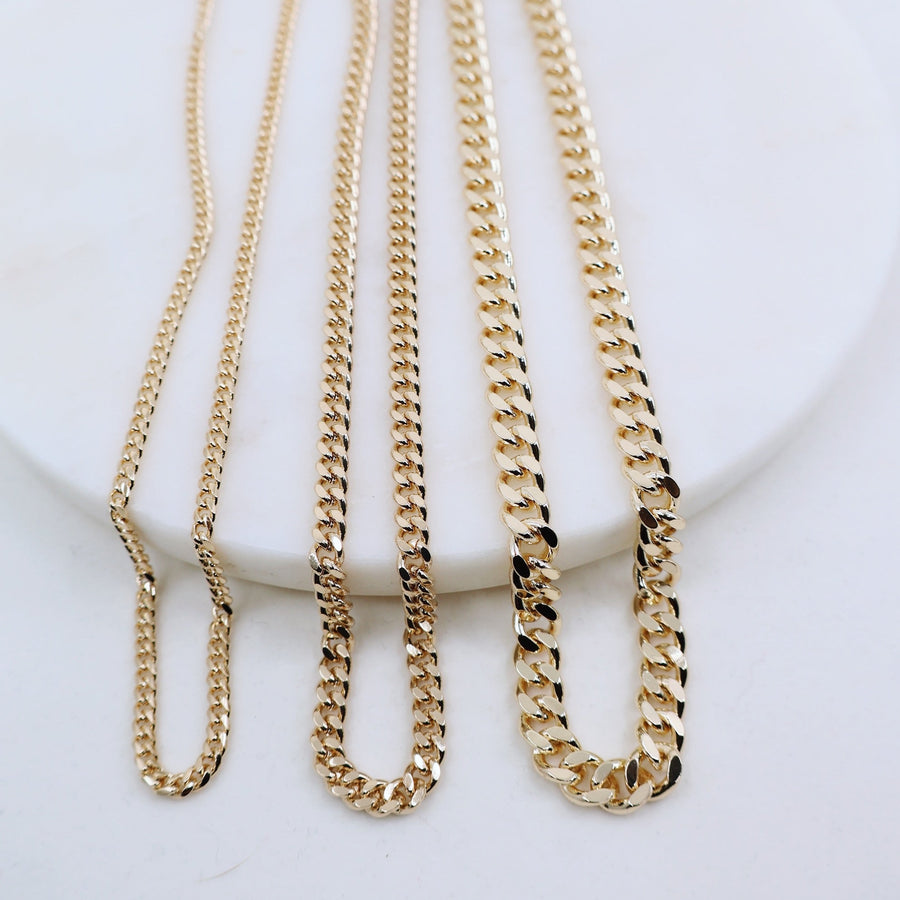 Megen Gabrielle Jewelry | Curb Chain necklace. gold fill necklace, 18k gold fill necklace, gold filled necklace, 18k gold fill necklace, Curb chain 18k gold fill. curb chain 14k gold fill.  curb chain necklace. cuban chain necklace. curb chain necklace gold. Cuban chain necklace. womens gold chain necklace. Thick curb chain necklace. Thin curb chain necklace. Thick cuban chain necklace. thin cuban chain necklace.