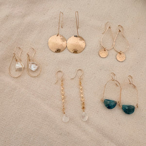 Megen Gabrielle Jewelry | 14k gold fill jewelry. 14k gold fill earrings, pearl earrings. gold and pearl earrings. dangle pearl earrings. coin pearl earrings. gold filled earrings, gold earrings. pearl earrings. gold hoop earrings for women. pearl drop hoop earrings for women. 