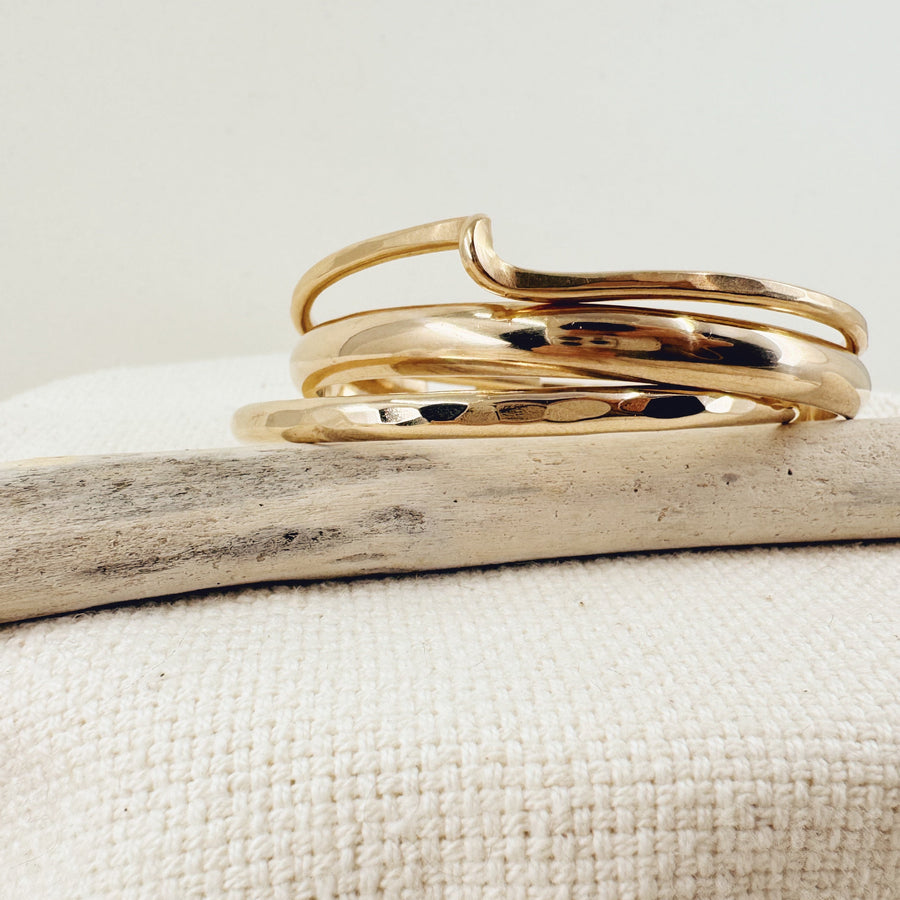 Megen Gabrielle Jewelry | The everyone adjustable cuff in sterling silver, 14K gold fill, and 14K rose gold fill. open cuff for adjustability.  