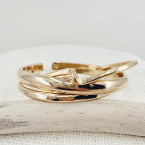 Megen Gabrielle Jewelry | The everyone adjustable cuff in sterling silver, 14K gold fill, and 14K rose gold fill. open cuff for adjustability.  Thick handmade bangle