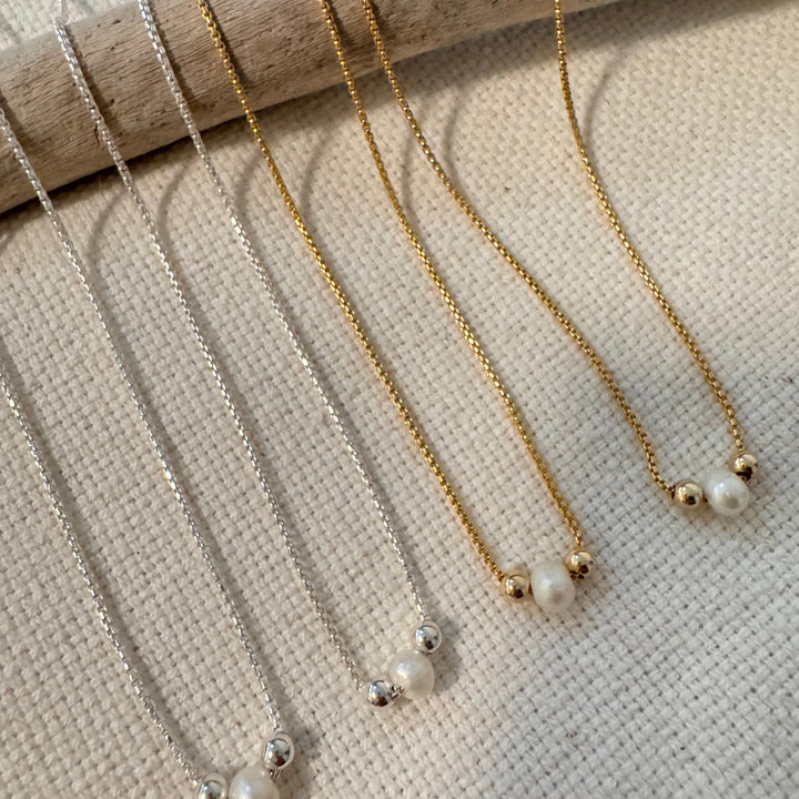 Megen Gabrielle Jewelry | Floating Pearl Necklace | Gold filled Pearl Jewelry | Handmade Pearl Jewelry | Pearl and gold pendant | Santa Cruz Handmade Jewelry 