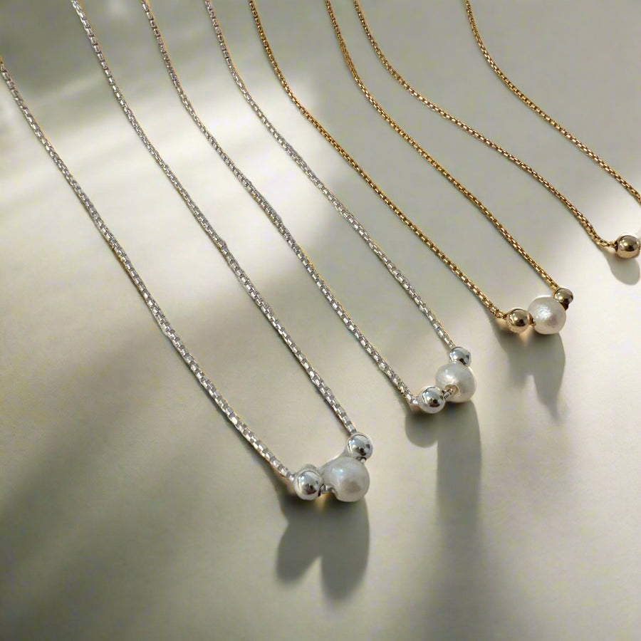 Megen Gabrielle Jewelry | Floating Pearl Necklace | Gold filled Pearl Jewelry | Handmade Pearl Jewelry | Pearl and gold pendant | Santa Cruz Handmade Jewelry 