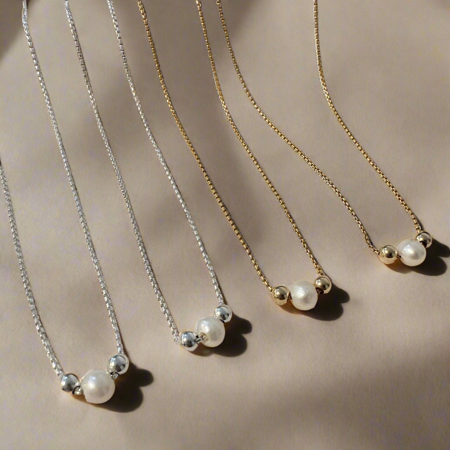 Megen Gabrielle Jewelry | Floating Pearl Necklace | Gold filled Pearl Jewelry | Handmade Pearl Jewelry | Pearl and gold pendant | Santa Cruz Handmade Jewelry 