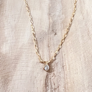 Megen Gabrielle Jewelry | Dainty style necklace with gold filled CZ on a 14K tiny paper clip chain.