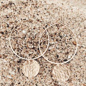 Megen Gabrielle Jewelry | Gold hoop earrings with hammered and textured gold circle.