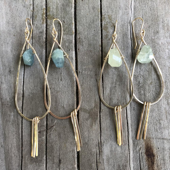 Megen Gabrielle Jewelry | Aquamarine Tassel Earrings. Tear drop hoop earrings with tassels and blue/ blue green stones. 