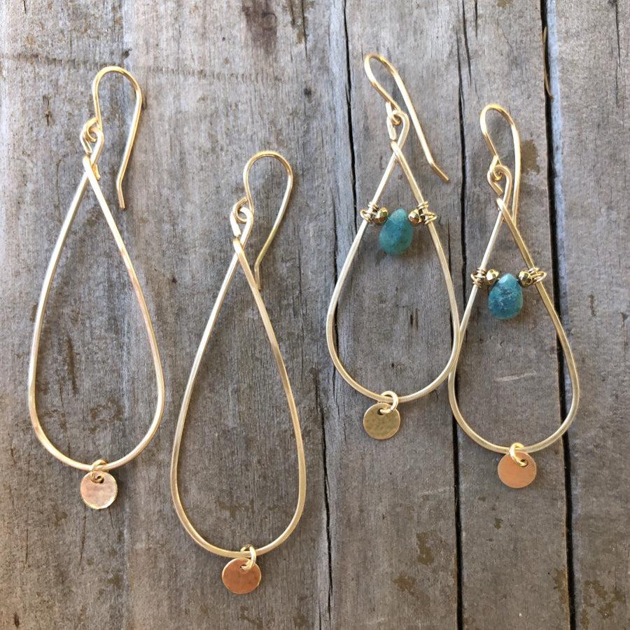 Megen Gabrielle Jewelry | teardrop-shaped hoop with gold disk drop and another pair of hoops wire wrapped with a chrysocolla stone and has a little circle drop as-well.